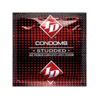 Condom package of studded condoms with 'ID' branding on a red and black patterned background