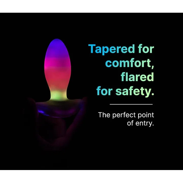 Colorful anal plug with text on a black background