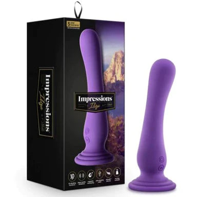 a purple smooth vibrator with a suction cup base, shown next to its black display box