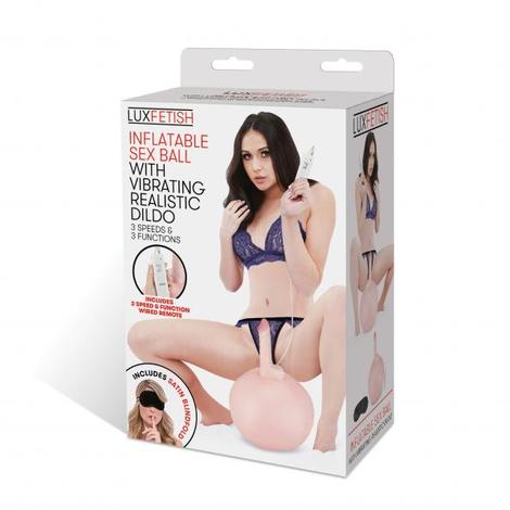 black box with woman riding beige inflatable ball with vibrating dildo attached to it