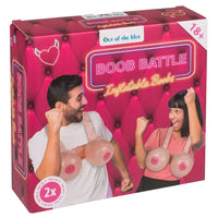 Box of 'Boob Battle' inflatable bras with two people on a pink background