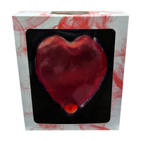 Heart-shaped product in a decorative box with floral patterns