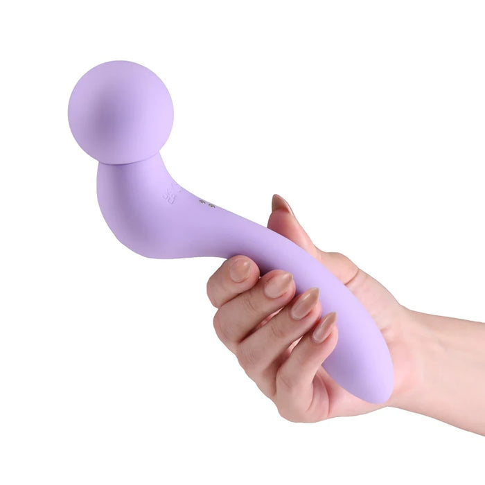 purple curved double ended wand held in hand