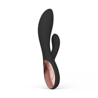 Black and pink silicone vibrator on a white background