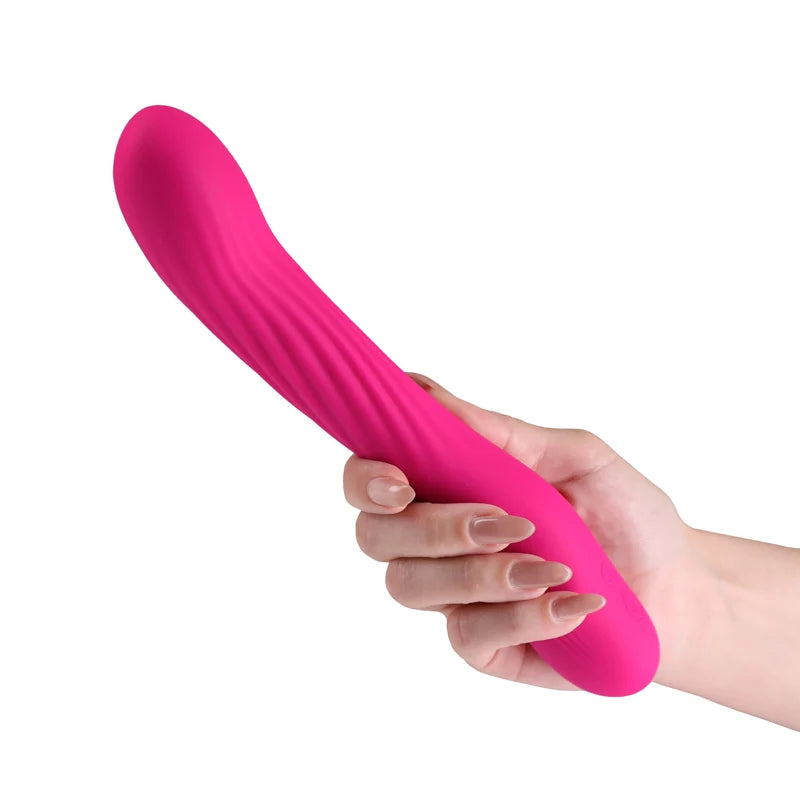 pink vibrator held in hand