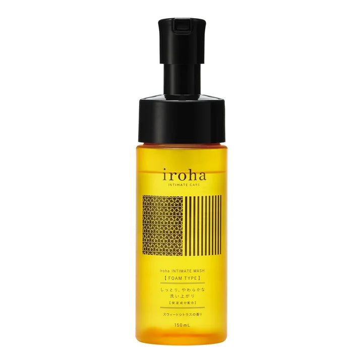 A bottle of iroha Skin Intimate Wash in the Flame Type formula, featuring a translucent amber-yellow liquid inside a clear bottle with a black pump dispenser, set against a plain white background.