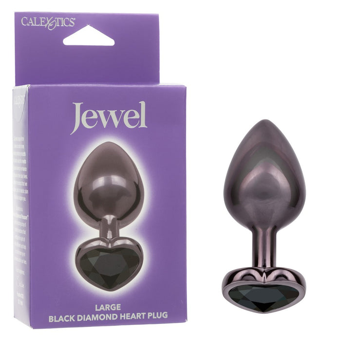 black large anal plug with heart shaped bottom with black gem beside box packaging