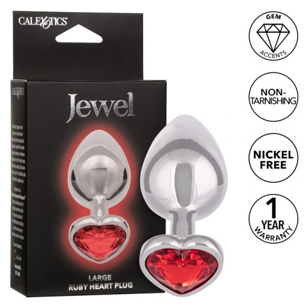 The product image shows a large anal plug with a red heart-shaped gem accent. The plug is silver, and the gem stands out prominently.