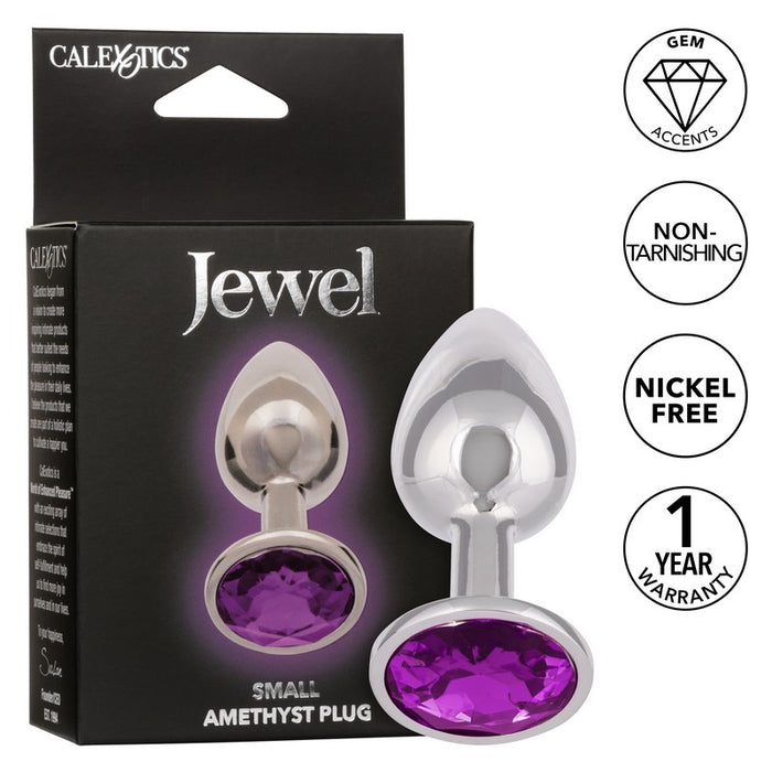 The product image shows a small, sleek anal plug with a smooth, metallic surface and a prominent purple amethyst gem at the base, packaged in a black box with the 'Jewel' brand prominently displayed.