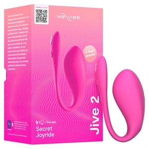 pink vibrating egg with tail beside box