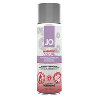 A 2 fl oz can of JO Warming Agape personal lubricant, water-based, featuring a white and purple label with red accents and a silver cap, set against a plain white background.