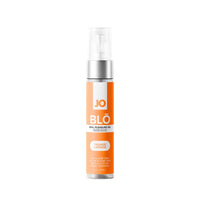 Orange and silver spray bottle jo oral pleasure gel orange limeade on a white background