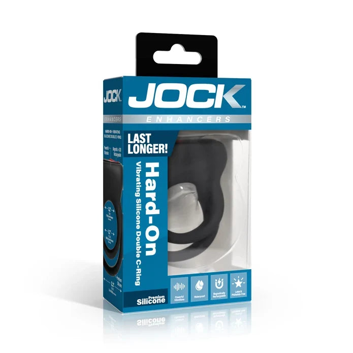 Jock Enhancers Hard-On Vibrating Silicone Double C-ring in its original retail packaging, featuring a black and blue box with a clear window showing the product inside.