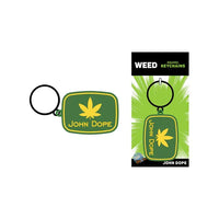 This image features the "John Dope Keychain" by Wood Rocket, which is made from premium metal, ensuring durability and a substantial feel. The keychain displays an eye-catching design in vibrant green with a prominent cannabis leaf symbol and the text "John Dope" in bold lettering.