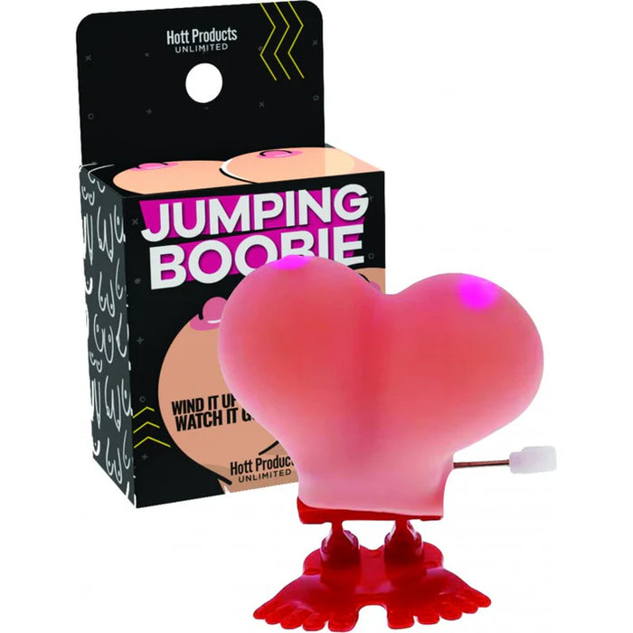 Pink and red 'Jumping Boobie' toy with packaging on a white background