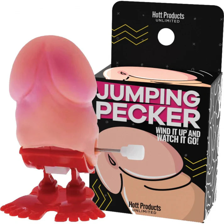 Pink and red 'Jumping Pecker' toy with packaging on a white background