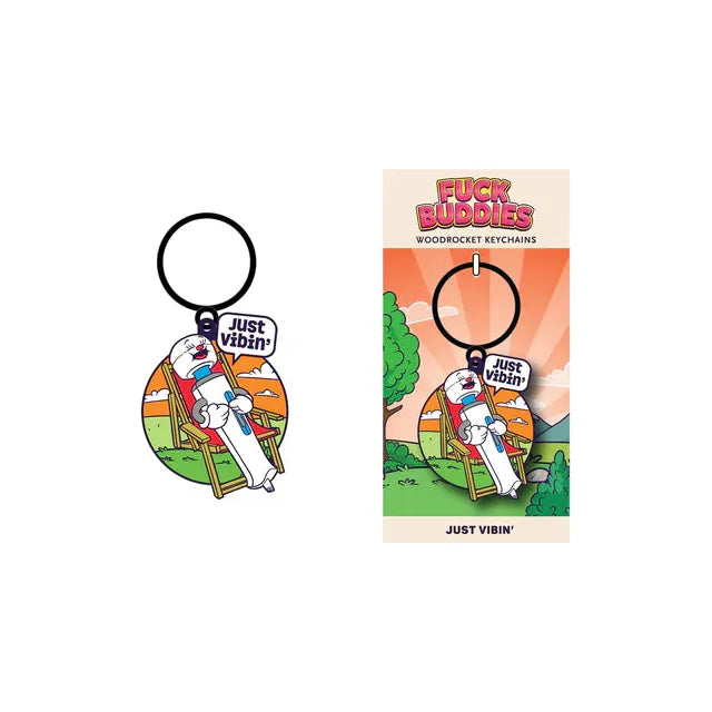 The image displays the "Just Vibin" Keychain by Wood Rocket, featuring a cartoon magic wand a circular metal keychain, attached to a card with the same design.