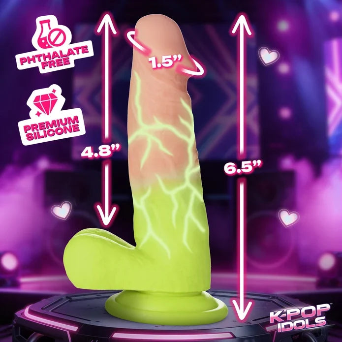 A silicone dildo shown on a glowing display stand with overlaid dimension arrows and text reading 4.8 inches, 6.