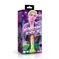 K-POP IDOLS Rainbow themed dildo packaging box, featuring a neon green and orange silicone dildo illustration on a purple and pink background with a holographic graphic of a man.