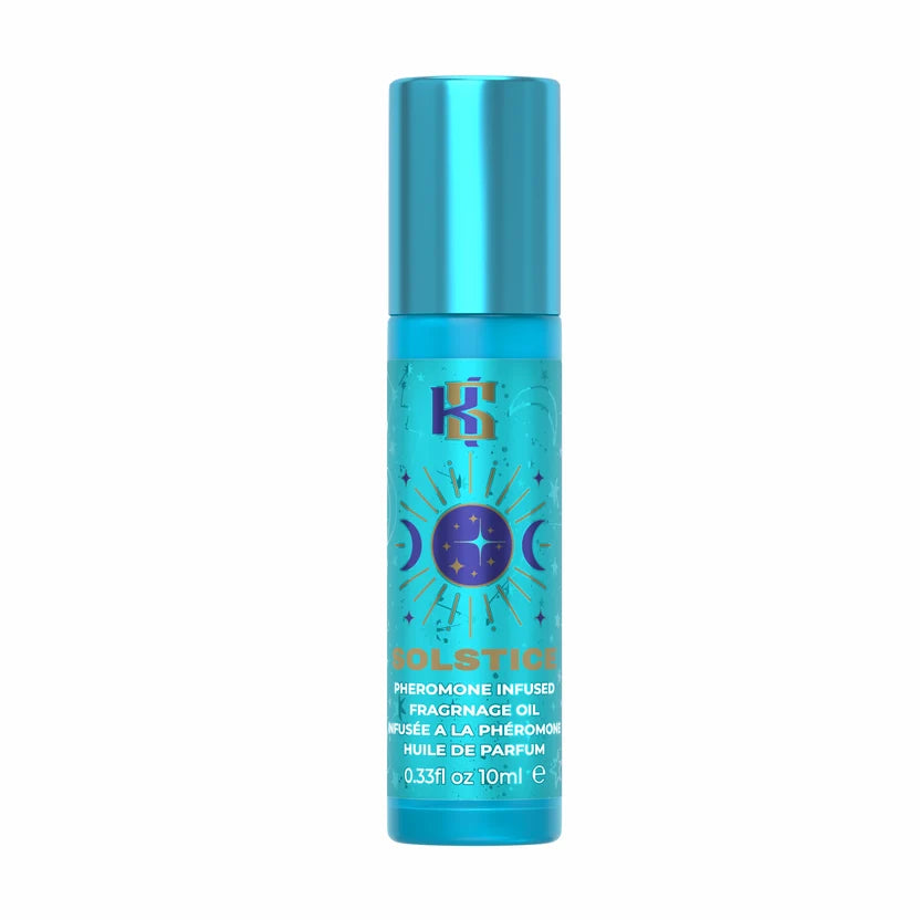 A 10ml spray bottle of KS Cosmetics Solstice Pheromone Infused Fragrance Oil. The bottle is a vibrant metallic turquoise blue with a matching cap, featuring a central purple celestial sun and moon graphic with gold text.