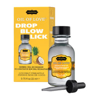 Bottle of 'Oil of Love' coconut pineapple with packaging on a white background