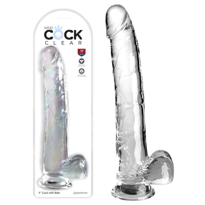 a clear detailed penis shaped dildo with balls and a suction cup, shown next to its plastic packaging