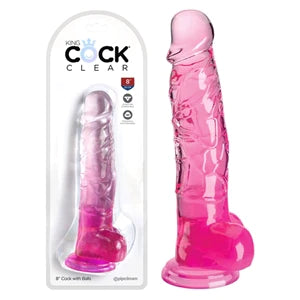 a pink detailed penis shaped dildo with balls and a suction cup, shown next to its plastic packaging