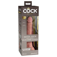 a beige penis shaped dildo with a suction cup base shown in its brown packaging