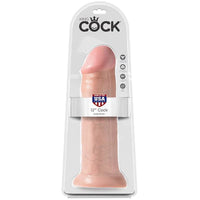 a beige penis shaped dildo with a suction cup base shown in its plastic packaging