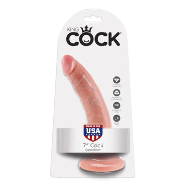 a beige penis shaped dildo with a suction cup base shown in its plastic packaging