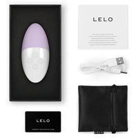 purple and white massager with accessories and lelo brand