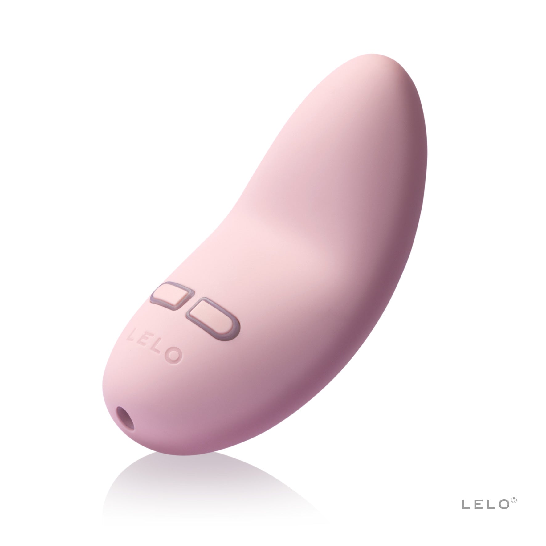 pink massager on white background