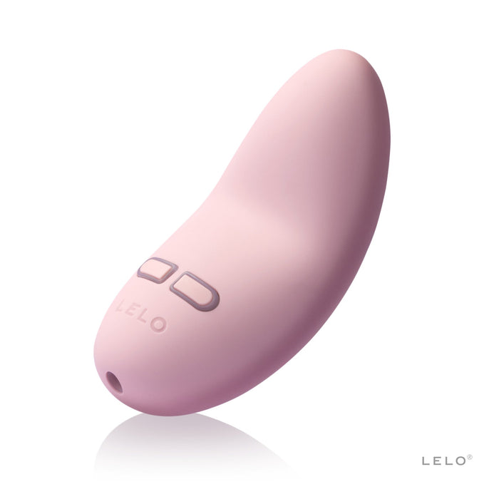 pink massager on white background