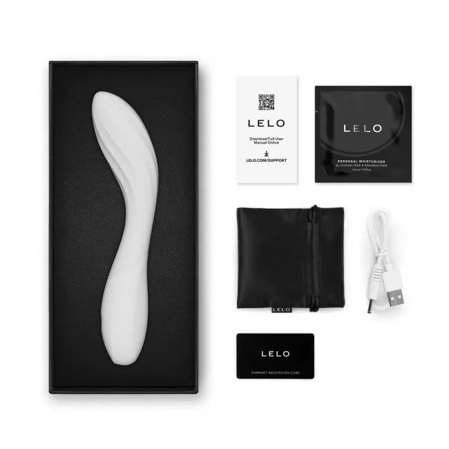 LELO personal massager set in black packaging, featuring a white curved wand massager, black carrying pouch, USB charging cable, and branded accessories on a white background.