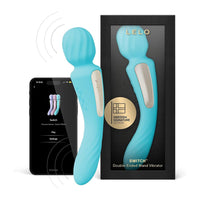 Turquoise double-ended lelo wand vibrator with packaging and smartphone displaying app interface on a white background