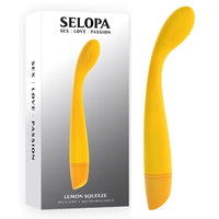 slim yellow g spot vibrator with a textured tip, shown with its display box 