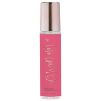 spray bottle with pink label pheromone spray