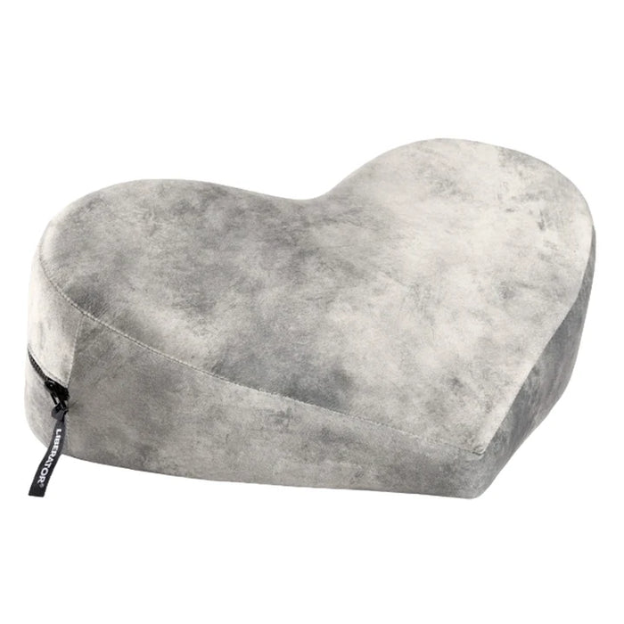 grey heart-shaped pillow on a white background