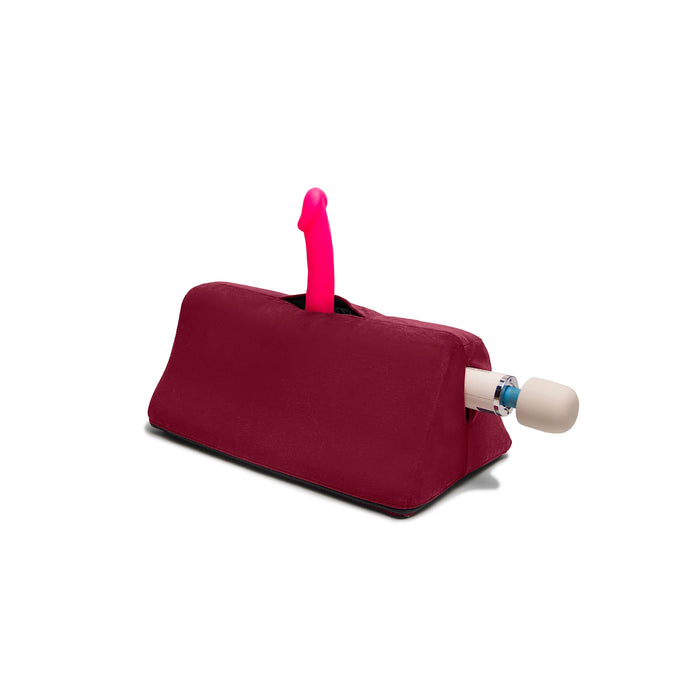 red wedge showing a magic wand and dildo 