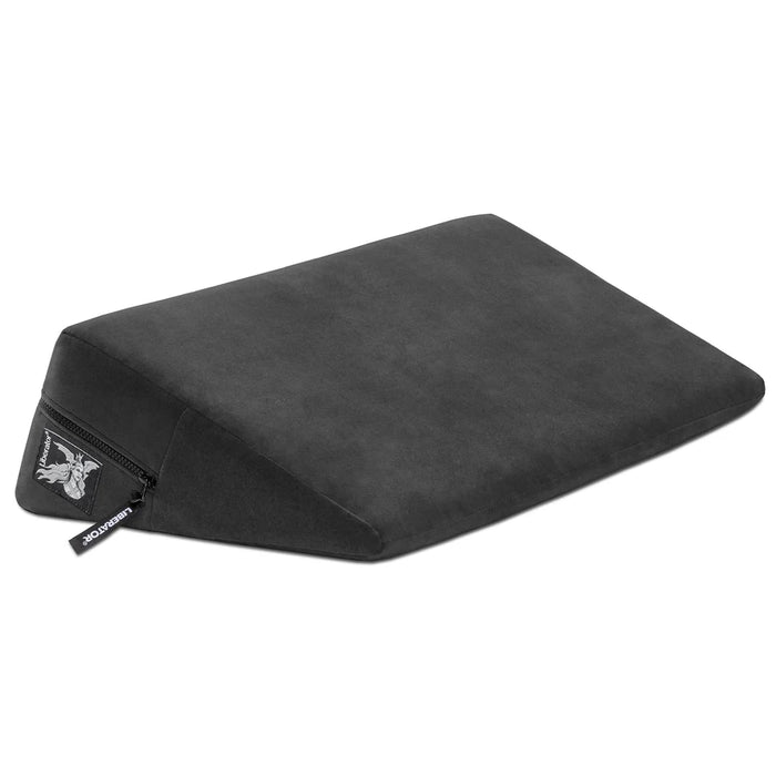 black wedge pillow with a liberator logo on a white background
