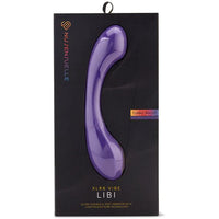 purple g spot vibrator with a thicker head and base, shown inside its black display box
