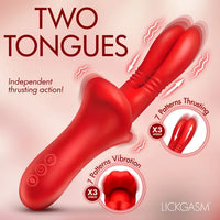 Red dual-tongue vibrator shown on a soft pink background with marketing text reading 'TWO TONGUES,' 'Independent thrusting action!,' '7 Patterns Thrusting,' and '7 Patterns Vibration.' The brand name LICKGASM appears in the lower right.