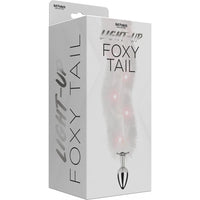white light up fox tail anal plug on box packaging
