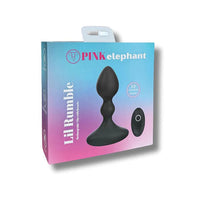 The retail packaging box for the PINK elephant Lil Rumble, featuring a black silicone plug and a black remote control printed on a blue-to-pink gradient box with a white hanging tab.