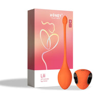 orange vibrating egg beside box
