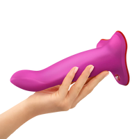 Purple and red limba flex L dildo held by a hand on a white background