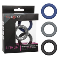 set of 3 silicone cock rings with 3 different textures  next to cal exotics box