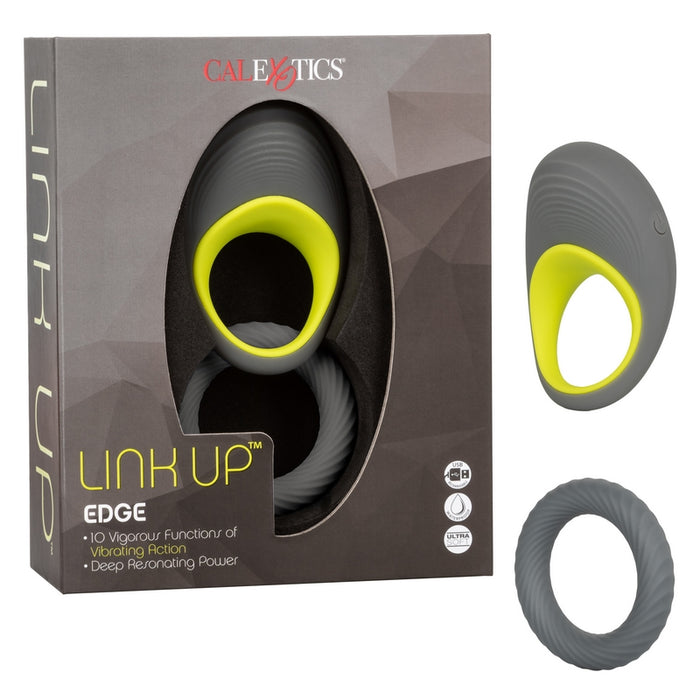 grey and yellow vibrating rechargeable cock ring with grey non vibrating cock ring next to link up box
