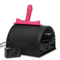 Black sex machine with pink component labeled 'The Saddle Pro' on a white background
