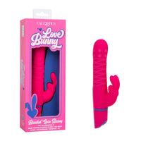 A bright pink beaded spin bunny vibrator shown next to its pink retail box on a plain white background. The packaging features the brand name CalExotics and the product name 'Love Bunny'.
